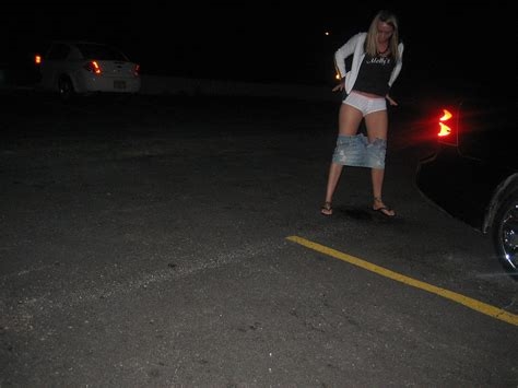 peeing in the parking lot nude